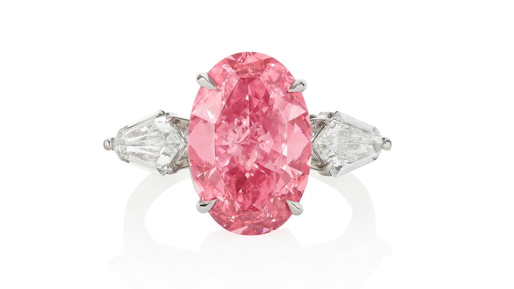 This 6.21-carat Type IIa fancy vivid pink diamond with VS1 clarity sold within its estimate of CHF 9.5 million to 13.6 million ($10.5 million to $15 million). 6 carat pink diamond